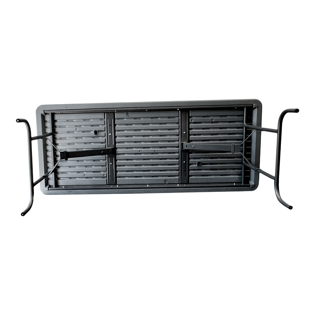 A picture of the underside of a charcoal folding table.
